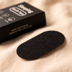 Close-up of a Rouzu Sleep Tape strip with the box behind