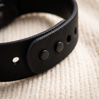 Close-up of the Rouzu band strap holes and snap closure